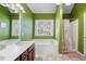 Bathroom with soaking tub, shower, and updated vanity at 104 Northcutt Station Pl, Acworth, GA 30101