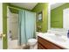 Clean bathroom with a shower/tub combo and a vanity at 104 Northcutt Station Pl, Acworth, GA 30101