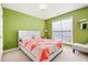 Bright bedroom with a queen bed and a large window at 104 Northcutt Station Pl, Acworth, GA 30101