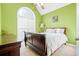 Spacious bedroom with a king-size bed and a ceiling fan at 104 Northcutt Station Pl, Acworth, GA 30101
