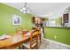 Kitchen with breakfast nook and a view into the dining area at 104 Northcutt Station Pl, Acworth, GA 30101