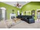 Spacious living room features a large sectional sofa and a cozy fireplace at 104 Northcutt Station Pl, Acworth, GA 30101