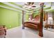 Main bedroom with large four-poster bed and access to the bathroom at 104 Northcutt Station Pl, Acworth, GA 30101