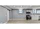 Newly renovated basement kitchen featuring white cabinets and stainless steel appliances at 1900 Mornington Ln, Snellville, GA 30078