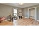 Spacious bedroom with hardwood floors, a large closet, and neutral walls at 1900 Mornington Ln, Snellville, GA 30078