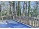 Wooden deck overlooking a wooded area at 1900 Mornington Ln, Snellville, GA 30078