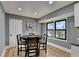 Bright dining area with hardwood floors and a charming round table at 1900 Mornington Ln, Snellville, GA 30078