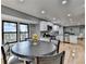 Bright dining area with hardwood floors and a charming round table at 1900 Mornington Ln, Snellville, GA 30078