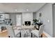 Living area featuring a whitewashed brick fireplace and hardwood floors at 1900 Mornington Ln, Snellville, GA 30078