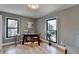 Bright home office features hardwood floors, built-in shelving, and large windows at 1900 Mornington Ln, Snellville, GA 30078