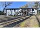 Ranch-style home exterior with deck and large backyard at 1900 Mornington Ln, Snellville, GA 30078