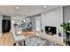 Modern kitchen with a breakfast bar and view of living space at 1900 Mornington Ln, Snellville, GA 30078
