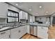 Modern kitchen with granite countertops and island at 1900 Mornington Ln, Snellville, GA 30078