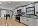 Modern kitchen with granite countertops and stainless steel appliances at 1900 Mornington Ln, Snellville, GA 30078