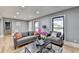 Bright living room with hardwood floors and large windows at 1900 Mornington Ln, Snellville, GA 30078