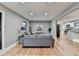 Open concept living room with hardwood floors and kitchen view at 1900 Mornington Ln, Snellville, GA 30078