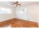 Spacious bedroom featuring hardwood floors and ceiling fan at 3762 Elkridge Dr, Decatur, GA 30032