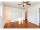 Hardwood floor bedroom with access to bathroom and another room at 3762 Elkridge Dr, Decatur, GA 30032