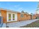 Ranch style home with brick exterior and patio at 3762 Elkridge Dr, Decatur, GA 30032