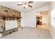 Open concept living room with kitchen view and fireplace at 3762 Elkridge Dr, Decatur, GA 30032