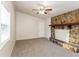 Living room with stone fireplace and ceiling fan at 3762 Elkridge Dr, Decatur, GA 30032