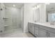 Bathroom features a walk-in shower and double vanity at 4745 Marjorie Dr, Cumming, GA 30041