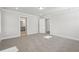 Well-lit bedroom featuring a private bathroom access at 4745 Marjorie Dr, Cumming, GA 30041