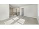 Spacious bonus room with carpet, neutral walls, and multiple windows at 4745 Marjorie Dr, Cumming, GA 30041