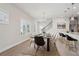 Modern dining room with table, chairs, and hardwood floors at 4745 Marjorie Dr, Cumming, GA 30041