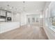 Open concept dining room with hardwood floors and access to kitchen at 4745 Marjorie Dr, Cumming, GA 30041
