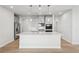 Spacious kitchen island with white quartz countertops at 4745 Marjorie Dr, Cumming, GA 30041