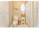 Charming bathroom with oval window, shower, and neutral decor at 4213 Bretdale Nw Run, Kennesaw, GA 30152