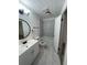 Updated bathroom with new vanity and marble tile at 1678 Se Christian Cir, Conyers, GA 30013