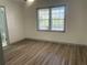 Bright bedroom with new flooring and fresh paint at 1678 Se Christian Cir, Conyers, GA 30013