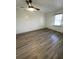 Spacious bedroom featuring new flooring and fresh paint at 1678 Se Christian Cir, Conyers, GA 30013