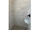 Clean shower with marble-look tile and gray hexagon floor tile at 1678 Se Christian Cir, Conyers, GA 30013