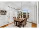 Charming dining room with hardwood floors and a rustic wooden table at 4552 Candytuft Nw Way, Acworth, GA 30102