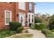 Inviting front entry with landscaping and a water feature at 4552 Candytuft Nw Way, Acworth, GA 30102