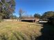 Expansive backyard perfect for entertaining with a fenced perimeter, under a bright blue sky at 4597 Karla Cir, Conley, GA 30288