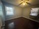 Bedroom with hardwood floors, neutral walls and a window at 4597 Karla Cir, Conley, GA 30288