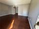 Inviting living room showcasing wood-look floors and fresh paint at 4597 Karla Cir, Conley, GA 30288