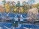Aerial view of condos surrounded by lush trees at 6851 Roswell Rd # I18, Sandy Springs, GA 30328