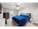 Bedroom with a comfortable bed, dresser, and ample natural light at 6851 Roswell Rd # I18, Sandy Springs, GA 30328