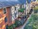 Aerial view of condo building with balconies and manicured grounds at 6851 Roswell Rd # I18, Sandy Springs, GA 30328