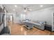 Spacious living room with hardwood floors and a comfortable sectional sofa at 6851 Roswell Rd # I18, Sandy Springs, GA 30328