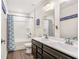 Bathroom with double sink vanity, tub, and shower at 467 Daffodil Ln, Mcdonough, GA 30253