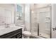 Bathroom featuring a glass-enclosed shower and a stylish vanity at 467 Daffodil Ln, Mcdonough, GA 30253