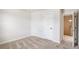 Bright room with an open door and lots of space for furniture at 467 Daffodil Ln, Mcdonough, GA 30253
