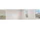 Bright room with three windows provides natural light at 467 Daffodil Ln, Mcdonough, GA 30253