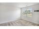 Bright bedroom featuring a window with blinds and neutral-toned walls and carpet at 467 Daffodil Ln, Mcdonough, GA 30253